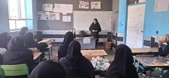 برگزاری کلاس آموزشی بیماریهای مشترک انسان ودام دردبیرستان عفاف شهرک هزارانی شهرستان آبدانان